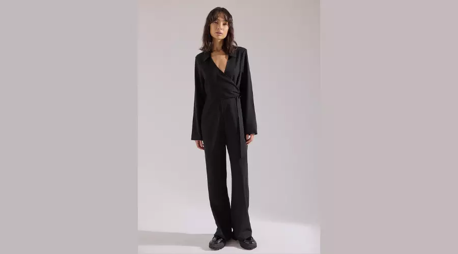 Jumpsuit with bow and detail on the waist