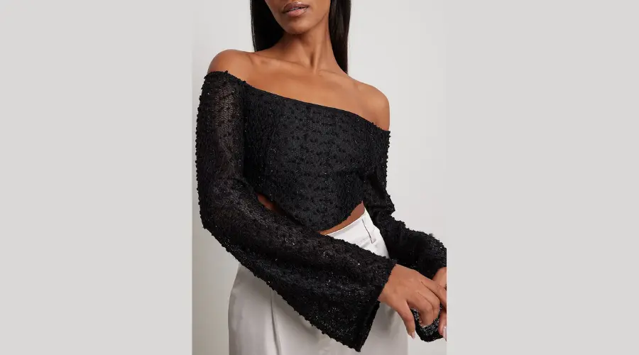 Structured glitter top with wide sleeves