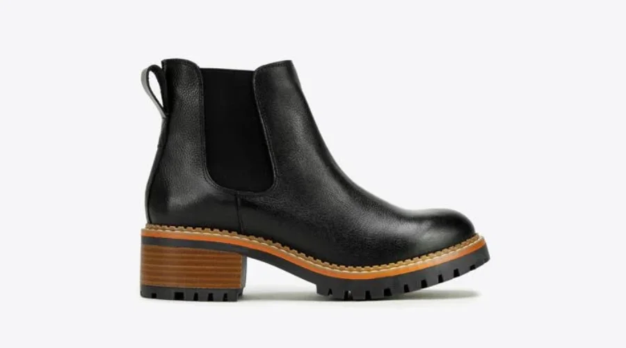 Women's black leather Chelsea boots with a grooved sole