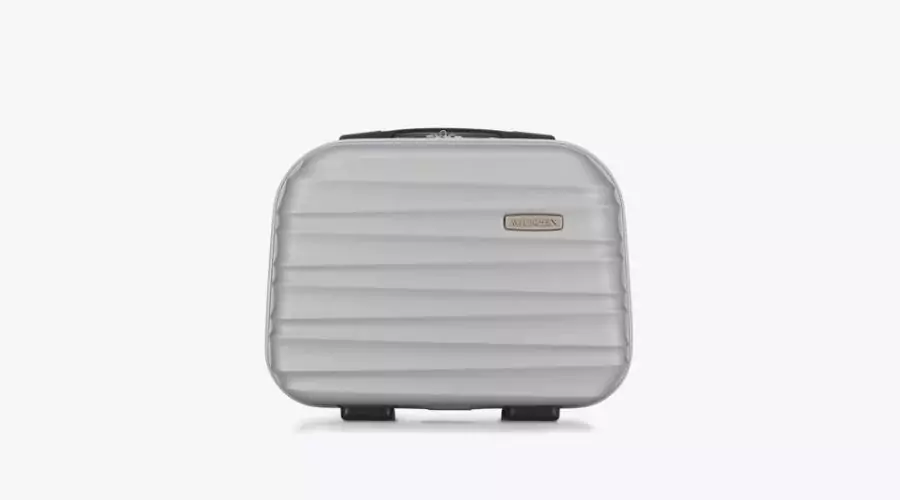 Large ABS suitcase - with a beige ID tag